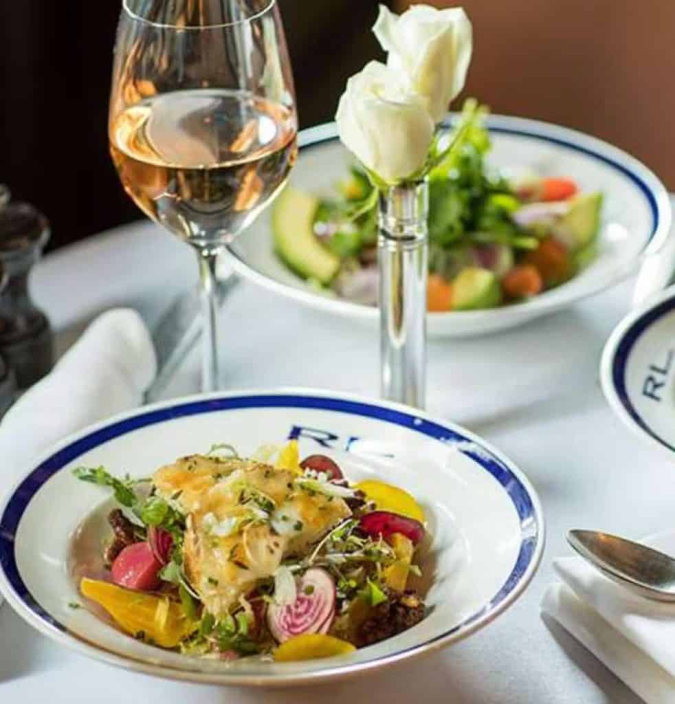 Dishes served at the RL Restaurant with a glass of white wine