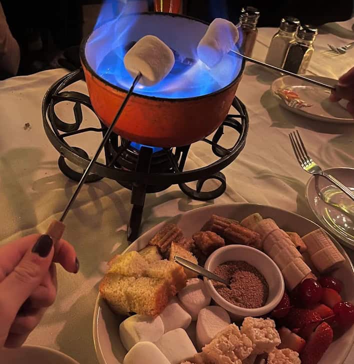 Roasting marshmallows at the table at Geja's cafe