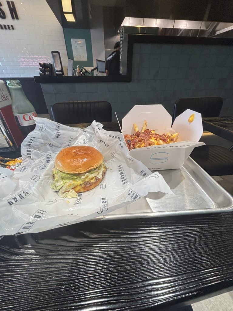 Pictured: Single burger with cheddar & bacon fries.